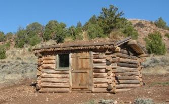 Historia: La cabaña de troncos Historia: La cabaña de troncos